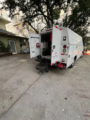 Magnet Plumbing service vehicle on-site for Water Heater Repair in Tree of Knowledge Corner